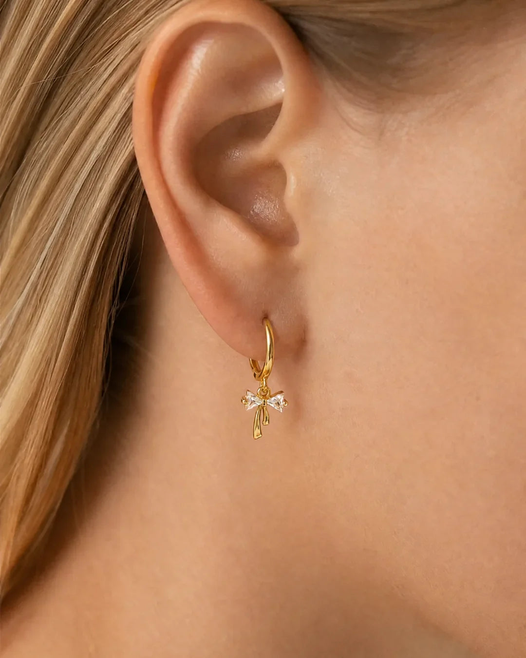 Celina Bow Huggie Earrings Lavish